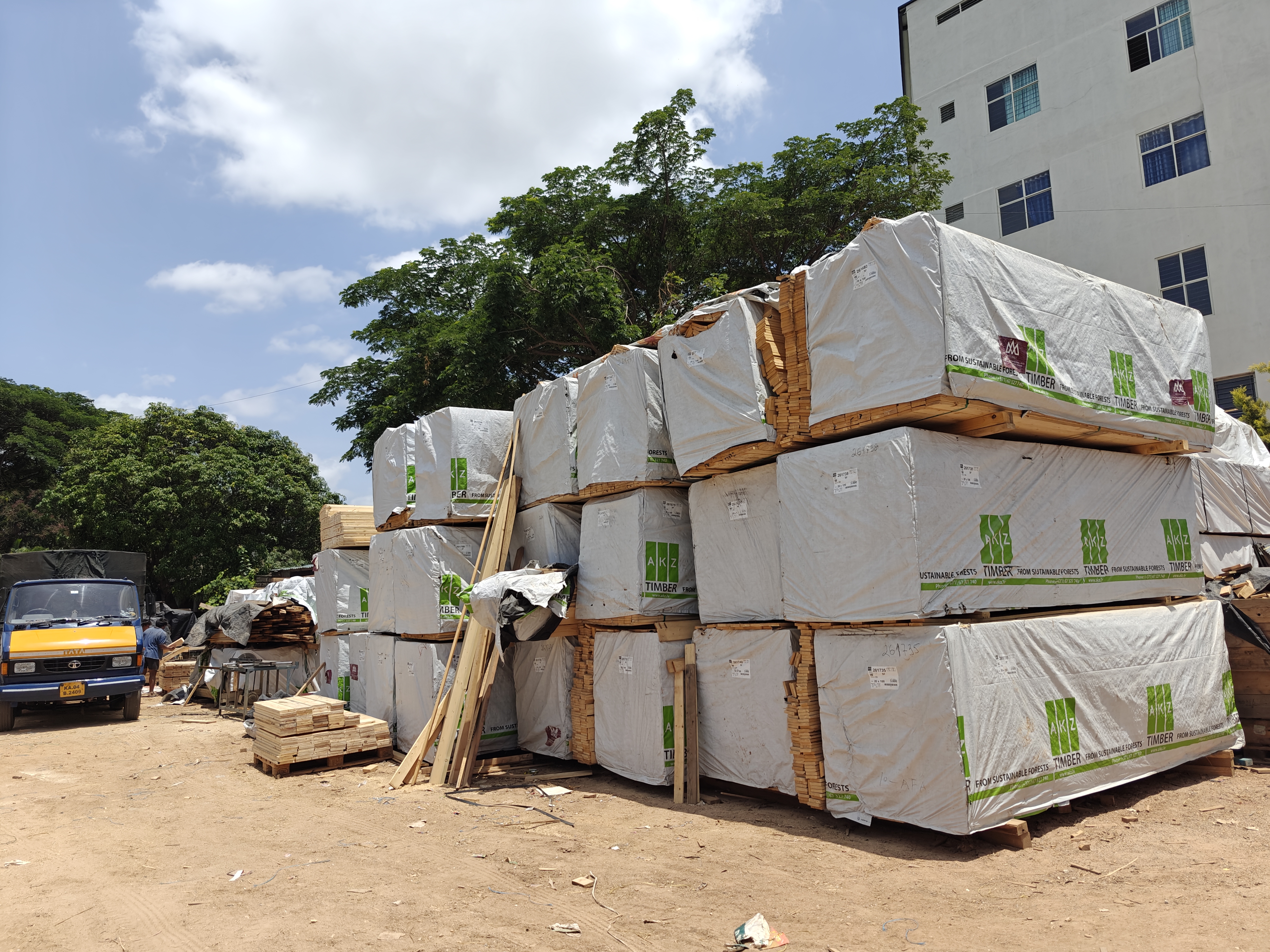 Stacked wooden planks ready for pallet manufacturing